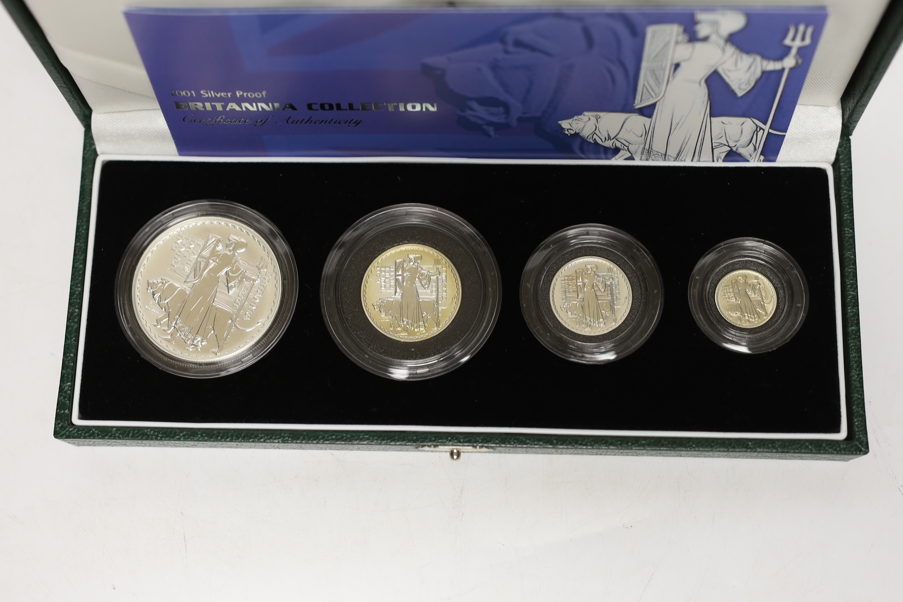 Three Royal Mint UK QEII four-coin silver proof Britannia collection sets for 1998, 2001 and 2008, 3 cases